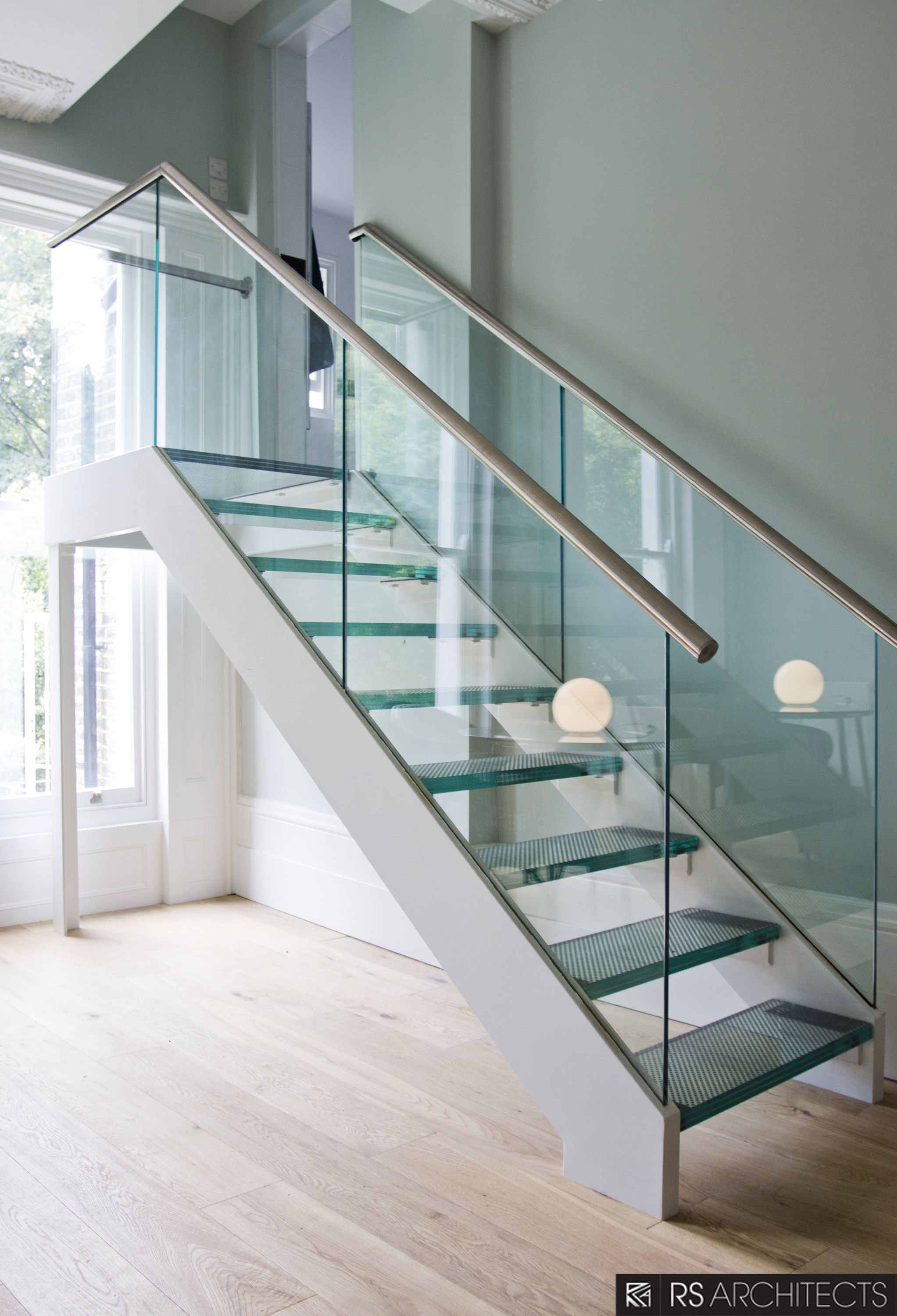 Glass stair railing installation in London