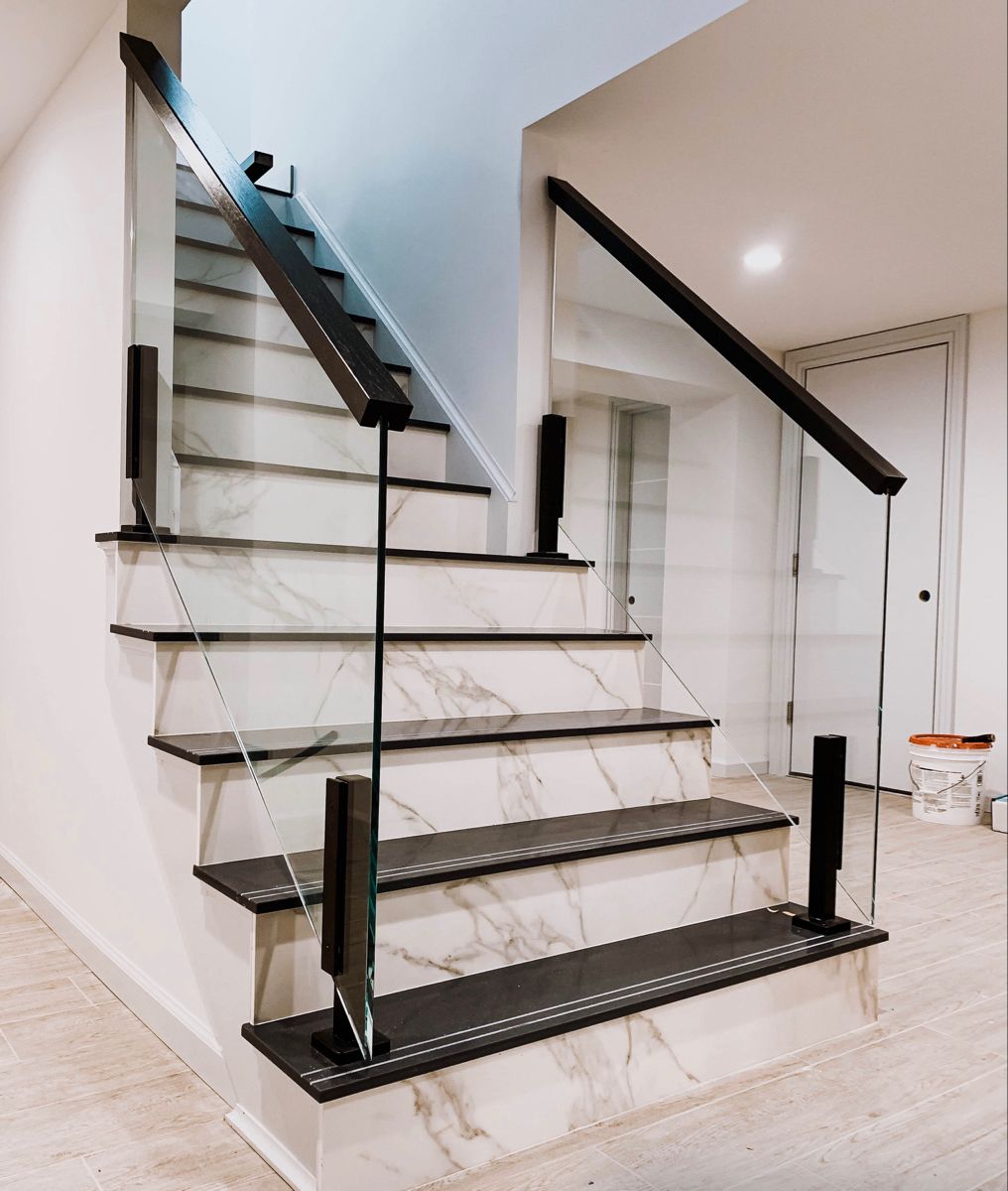Glass stair railing installation in London